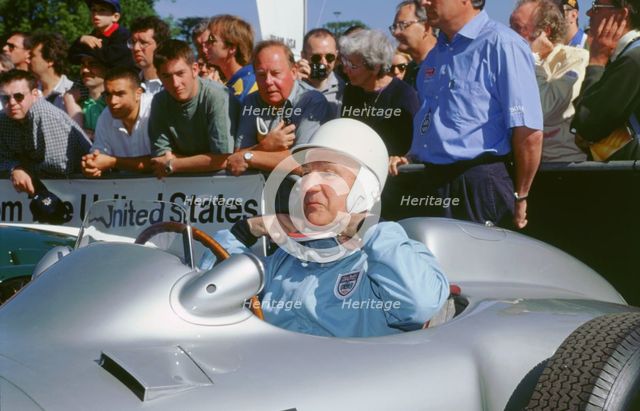 Stirling Moss prepares for the off. Goodwood festival of speed. Artist: Unknown.