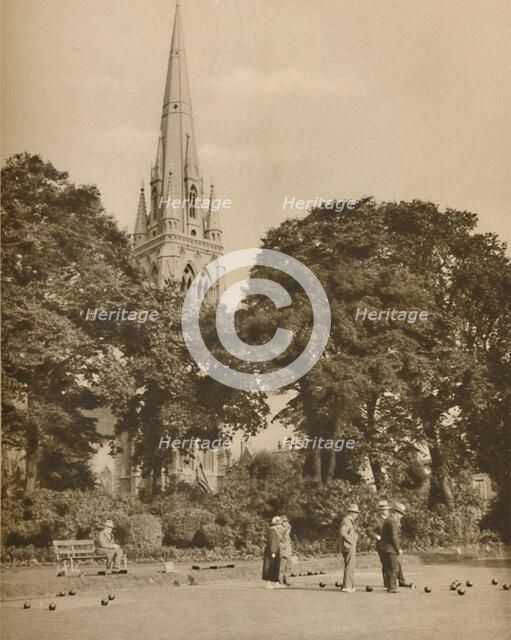 'Stoke Newington in Summer-Time: The Bowling Green at Clissold Park', c1935. Creator: Donald McLeish.