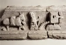 Stone carving depicting milling, museum of Rievaulx Abbey, North Yorkshire, c2013