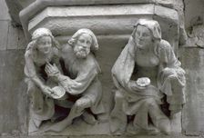 Stone carving on the side of a house in Bruges