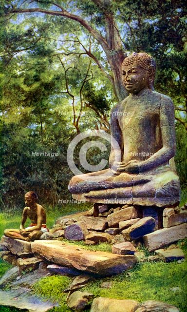 Stone Buddha, a relic of the past glory of Anuradhapura, Ceylon, c1924. Artist: Unknown