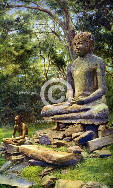 Stone Buddha, a relic of the past glory of Anuradhapura, Ceylon, c1924. Artist: Unknown