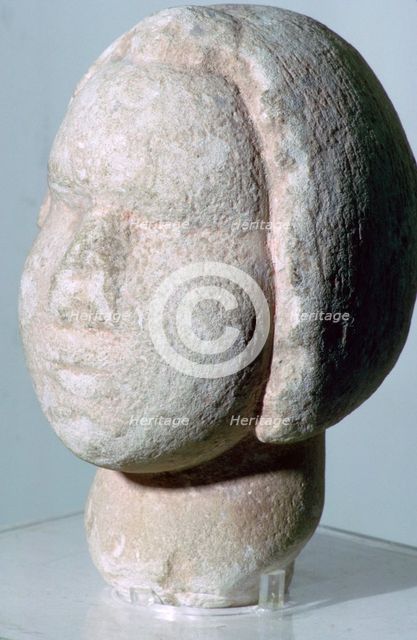 Stone head of 'Fat Lady'. Artist: Unknown
