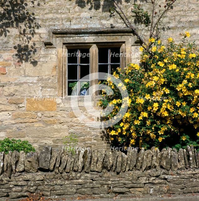 Stone mullioned cottage window, Lower Slaughter, Cotswolds, Gloucestershire, c2000s(?). Artist: Historic England Staff Photographer.
