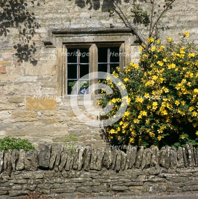 Stone mullioned cottage window, Lower Slaughter, Cotswolds, Gloucestershire, c2000s(?). Artist: Historic England Staff Photographer.