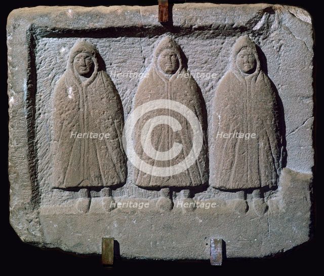 Stone relief of a trio of hooded Romano-British deities, 3rd century. Artist: Unknown