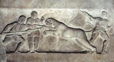 Stone relief ofStone relief of Gladiators fighting a lion, Turkey, c 323BC-31BC