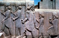 Stone relief showing subjects bringing tribute, South Iran, 6th-5th century BC
