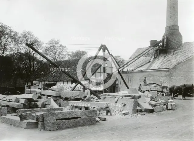 Stonecutters working with granite, Landskrona, Sweden, 1930. Creator: Unknown.