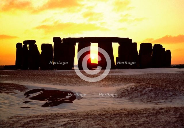 Stonehenge sunset, Wiltshire. Artist: Unknown.