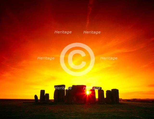Stonehenge sunset, Wiltshire. Artist: Unknown.