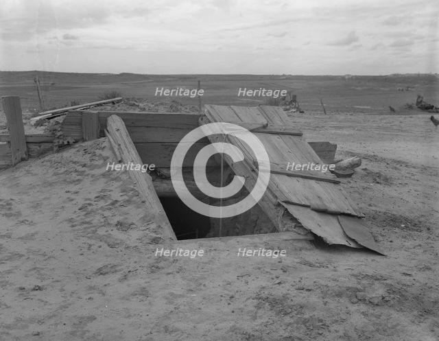 Storm cellar on the Texas plains, West Texas Panhandle, 1937. Creator: Dorothea Lange.