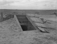 Storm cellar on the Texas plains, West Texas Panhandle, 1937. Creator: Dorothea Lange