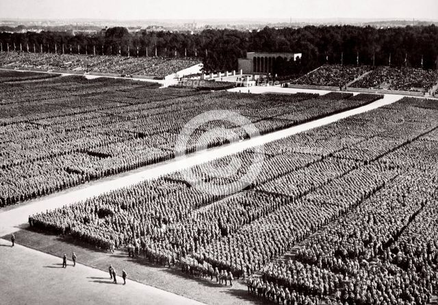 Stormtroopers lined up on parade during a Nazi Party Congress in Nuremberg, Germany, 1936. Artist: Unknown