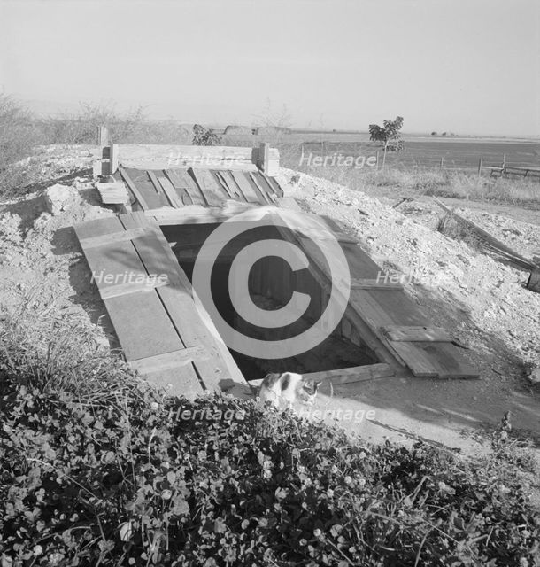 Storage cellar, typical of area, Dead Ox Flat, Malheur County, Oregon, 1939. Creator: Dorothea Lange.