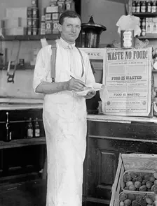 Store Interior - Waste No Food 1917 or 1918. Creator: Harris & Ewing