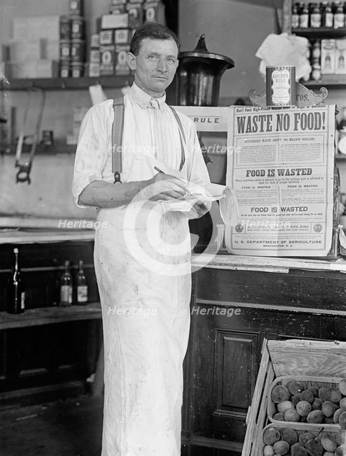 Store Interior - 'Waste No Food', 1917 or 1918. Creator: Harris & Ewing.