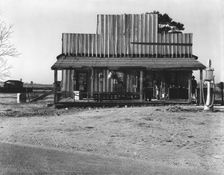 Store with false front, Vicinity of Selma, Alabama, 1936. Creator: Walker Evans