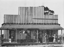 Store with false front, Vicinity of Selma, Alabama, 1936. Creator: Walker Evans