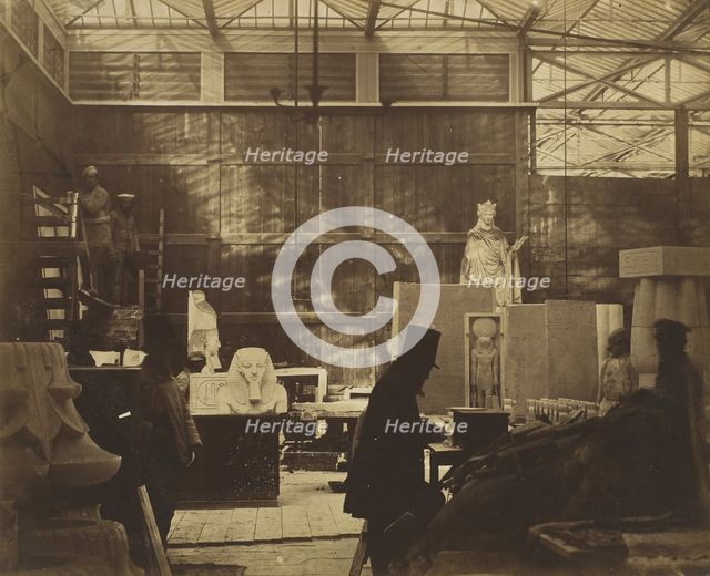 [Storeroom with Artisans and Plaster Casts, Crystal Palace], 1852. Creator: Philip Henry Delamotte.