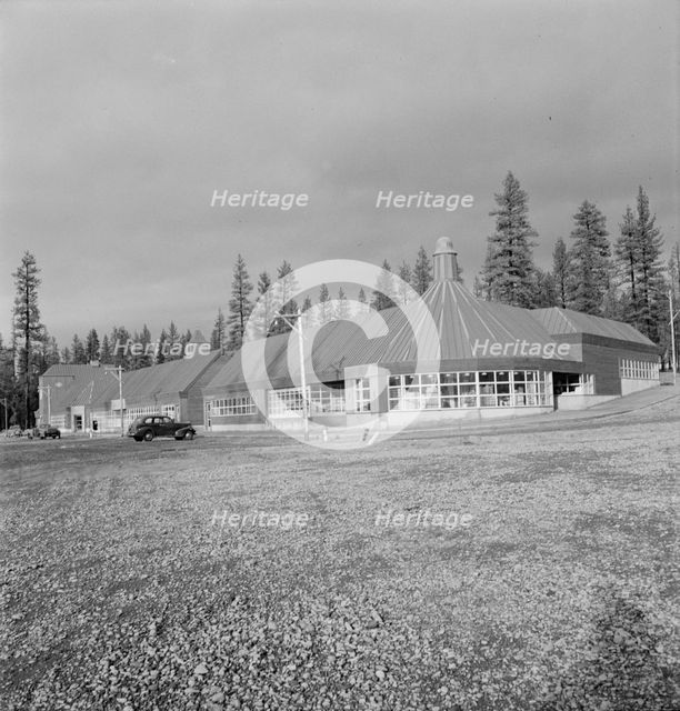 Stores and community center in model lumber company town, Gilchrist, Oregon, 1939. Creator: Dorothea Lange.