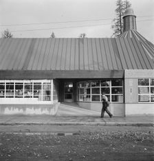 Stores and community center in model lumber company town, Gilchrist, Oregon, 1939. Creator: Dorothea Lange