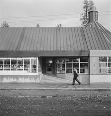 Stores and community center in model lumber company town, Gilchrist, Oregon, 1939. Creator: Dorothea Lange