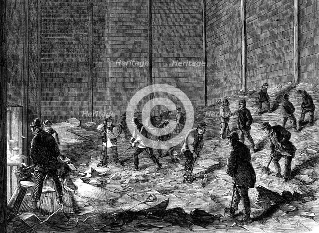 Storing ice in insulated sheds at Charles's Ice Store, Chelsea, London, 1861. Artist: Unknown