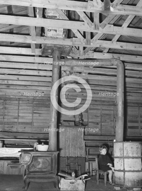 Stoves in former country church now used as residence, near Laurel, Mississippi, 1939. Creator: Dorothea Lange.