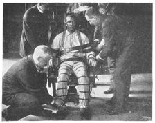 Strapping the Victim into the Death Chair United States, 1898