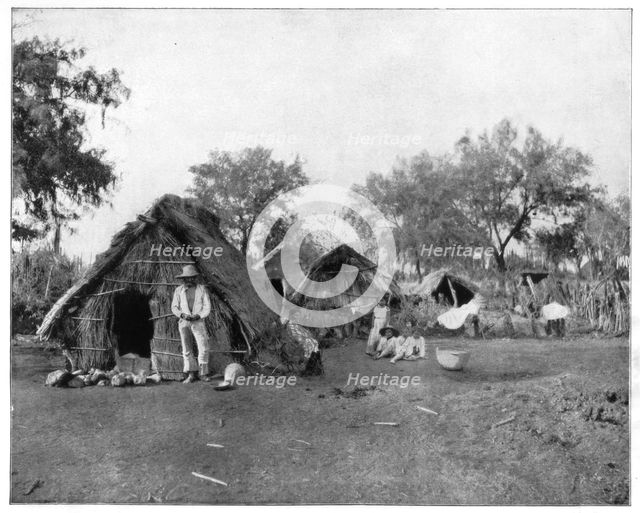 Straw cottages, Salamanca, Mexico, late 19th century.Artist: John L Stoddard