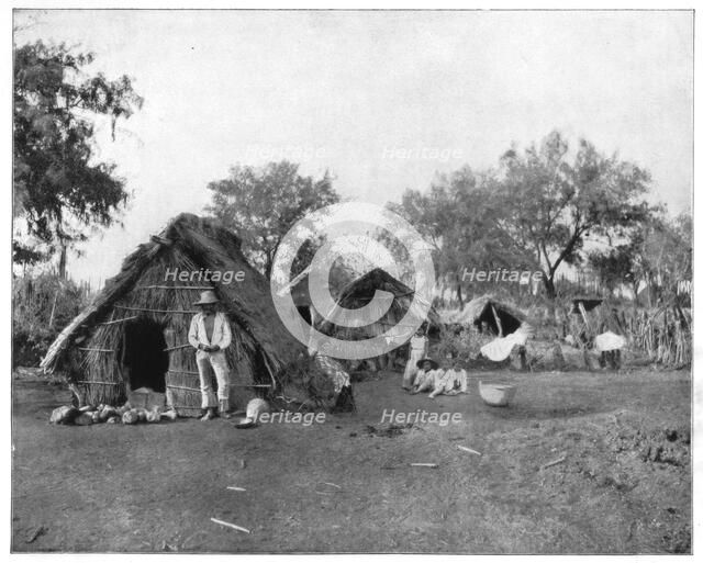 Straw cottages, Salamanca, Mexico, late 19th century.Artist: John L Stoddard