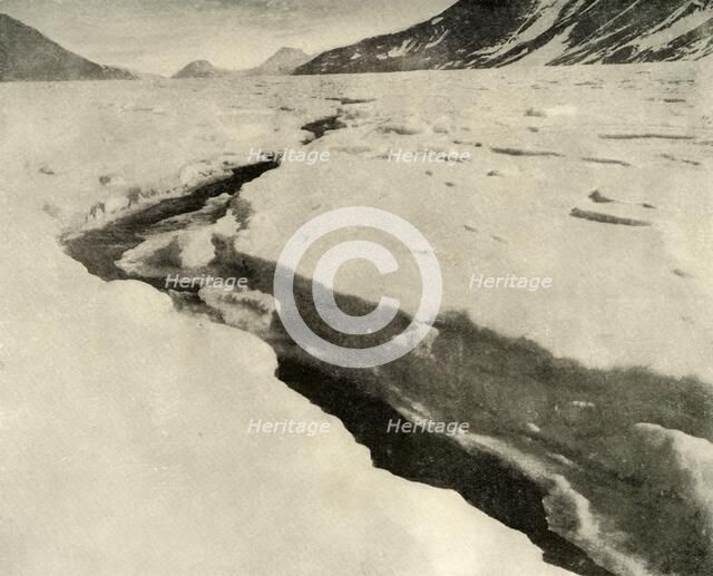 'Stream of Running Water in the Middle of the Ferrar Glacier in Midsummer', c1908, (1909).  Artist: Unknown.