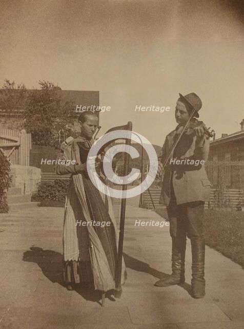 Street musicians with a harp and violin in the upper yard of Dom Smith, Vladivostok, Russia, (1899?) Creator: Eleanor Lord Pray.