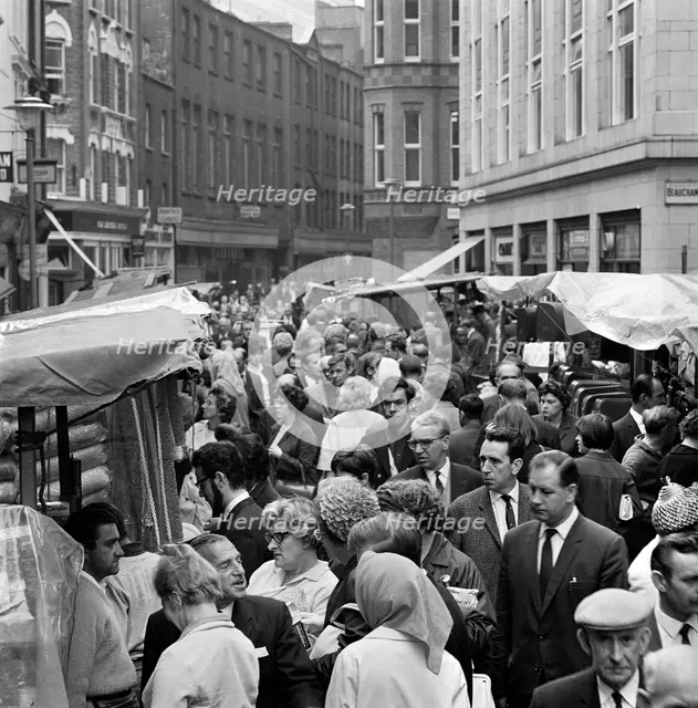 Street market at Leather Lane, Holborn, London, 1960s. Artist: John Gay
