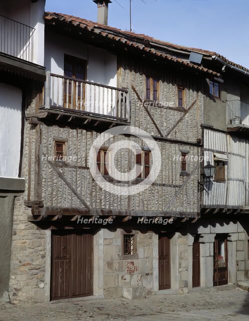 Street of La Alberca (Salamanca), and a house façade.