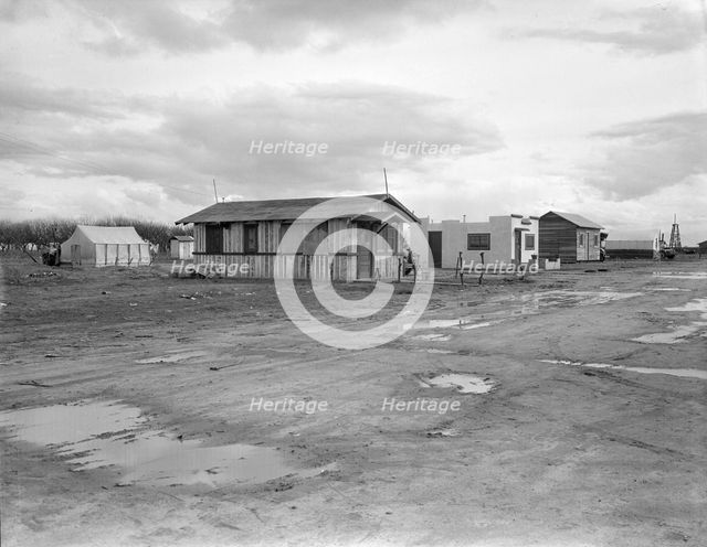 Street and homes in "Little Oklahoma", California, 1936. Creator: Dorothea Lange.