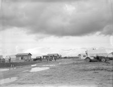 Street and homes in "Little Oklahoma", California, 1936. Creator: Dorothea Lange