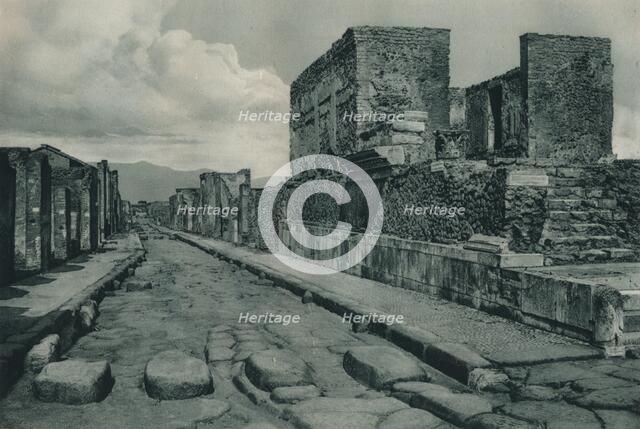 Street between ruins, Pompeii, Italy, 1927. Creator: Eugen Poppel.