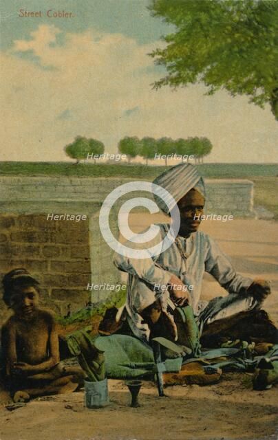 'Street Cobler', c1900. Artist: Unknown.