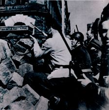 Street fighting in Prague, 1945. Creator: Unknown
