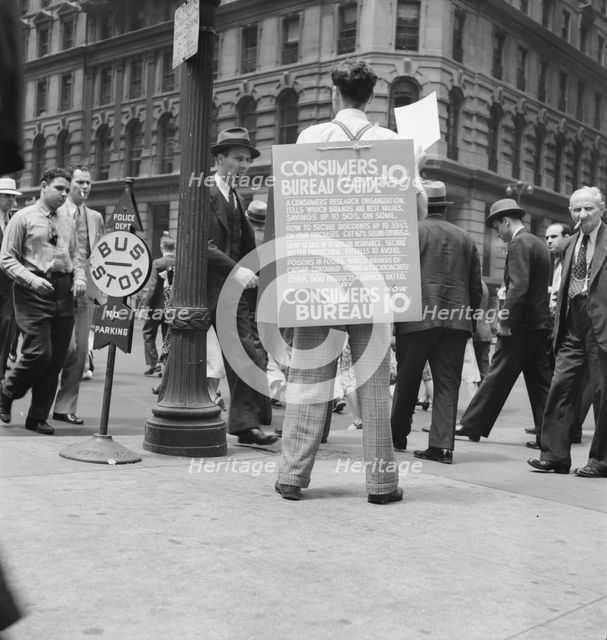 Street hawker selling Consumer's..., 42nd Street and Madison Avenue, New York City, 1939. Creator: Dorothea Lange.