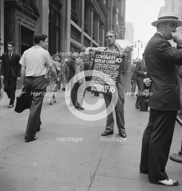 Street hawker selling Consumer's..., 42nd Street and Madison Avenue, New York City, 1939. Creator: Dorothea Lange.
