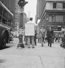 Street hawker selling Consumer's..., 42nd Street and Madison Avenue, New York City, 1939. Creator: Dorothea Lange
