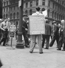 Street hawker selling Consumer's..., 42nd Street and Madison Avenue, New York City, 1939. Creator: Dorothea Lange