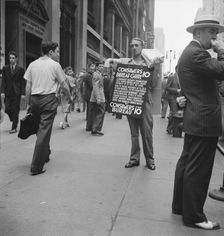 Street hawker selling Consumer's..., 42nd Street and Madison Avenue, New York City, 1939. Creator: Dorothea Lange