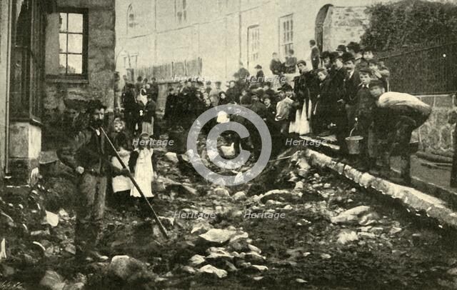 'Street in St. Ives After A Visit From A Flood', 1901. Creator: Unknown.
