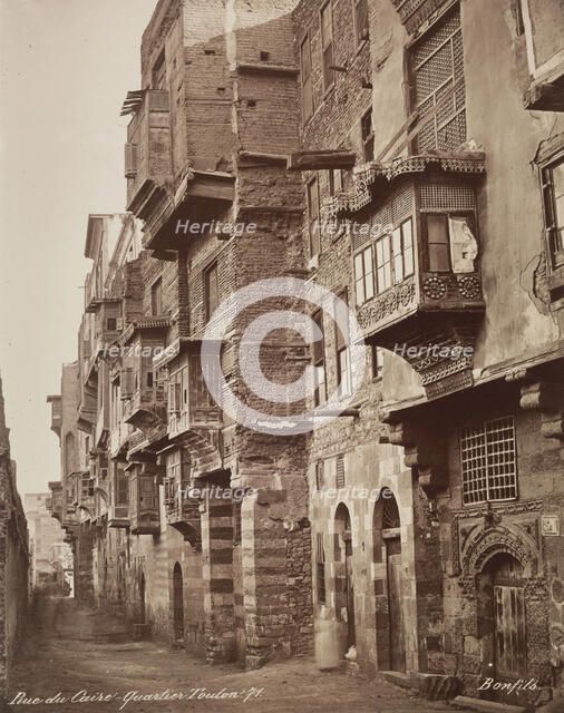 Street in the Area of Ibn Tulun Mosque, Cairo, 19th century. Creator: Maison Bonfils.