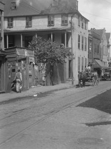 Street scene, [75 King Street], Charleston, South Carolina, between 1920 and 1926. Creator: Arnold Genthe