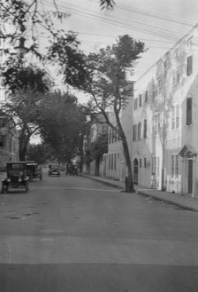 Street scene, New Orleans or Charleston, South Carolina, between 1920 and 1926. Creator: Arnold Genthe